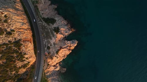 A Highway Along the Mediterranean Sea in Turkey Aerial View of the Coastline Road Cars Driving Along