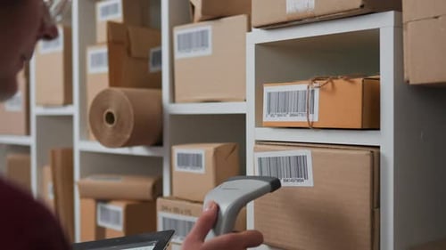 Close Up Of The Process Of Scanning With A Handheld Scanner With A Red Laser Barcode That Is Pasted