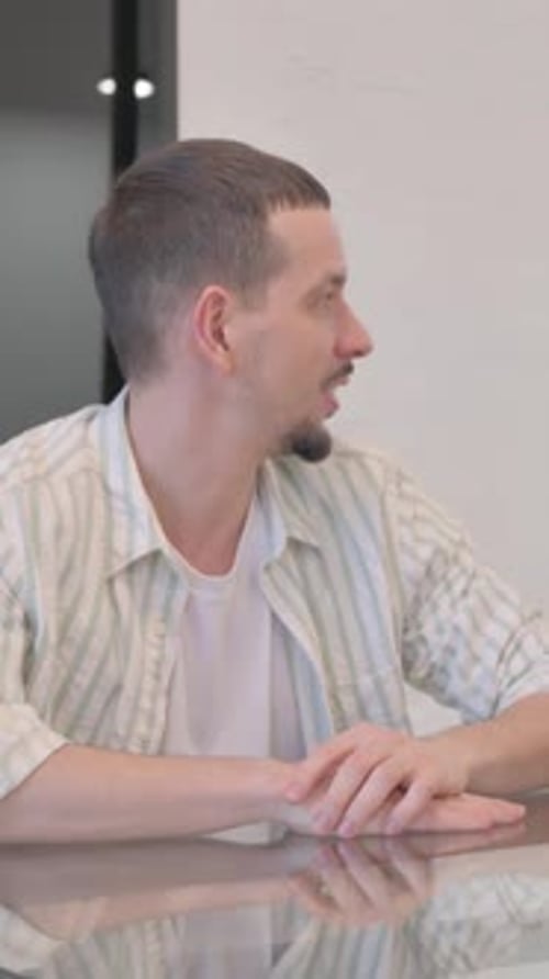 Creative Man Talking with Male Worker in Office, vertical video