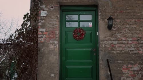 Festive Wreath on Front Door in Winter