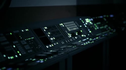 A Dimly Lit Sci Fi Laboratory Features an Array of Glowing Control Panels