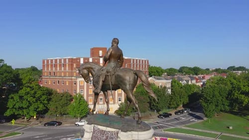 Drone shot of the Robert E. Lee Statue in Richmond Virginia on Monument ave. The statue has differen