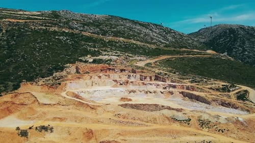 Aerial shot of turkish marble quarry in mountain slope