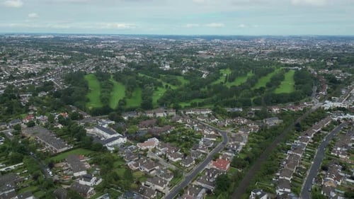 Aerial View of Suburban Neighborhood and Green Spaces