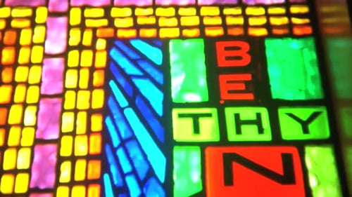 Abstract Colorful Stained Glass Window Art with Letters
