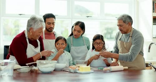 Family Baking Together in Bright Kitchen at Home