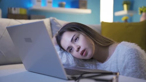 Woman Working At Home Getting Tired