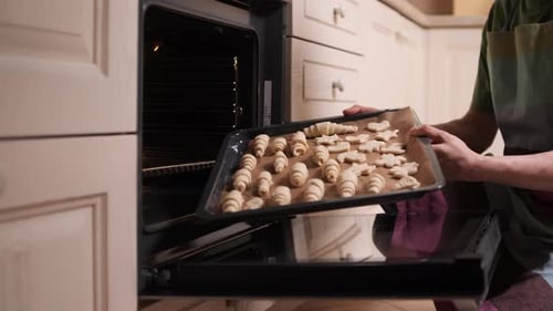 Preparing Homemade Cookies for Baking in Kitchen