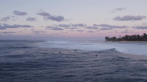 Surfers at Sunset, North Shore, Oahu