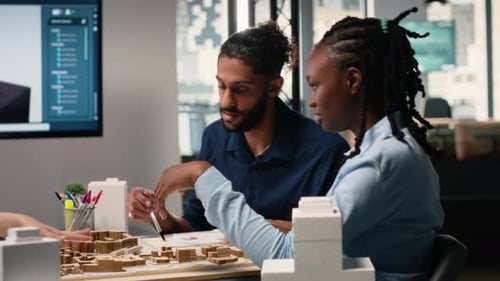 Engineers and Real Estate Developers Reviewing Smart City Design Layout