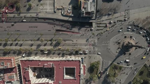 Birds Eye Shot of Traffic in Streets Around Columbus Monument