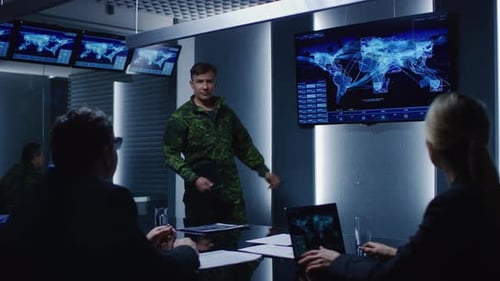 Military Man Briefing Team in Modern Conference Room