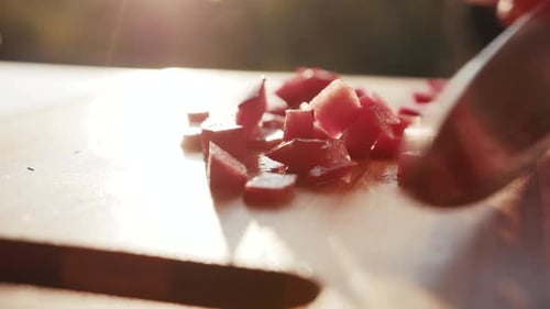 A Female Chef Chopping a Juicy Sweet Red Bell Pepper on a Wooden Chopping Board Restaurant Cuisine