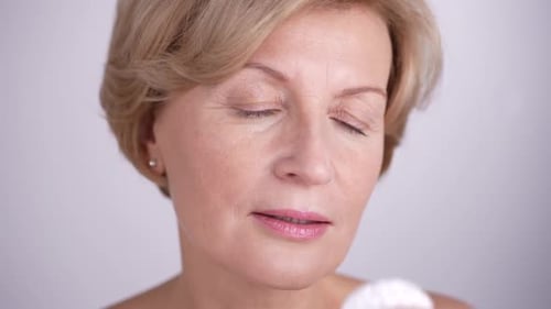 Charming Lady Removing Makeup