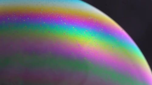 Abstrakte bunte Seifenblasen-Textur, Science-Fiction-Planetenatmosphäre. Zeitlupe.