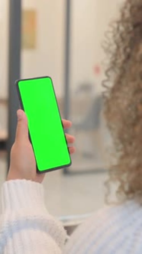 African Woman Using Phone with Green Screen, Vertical Video