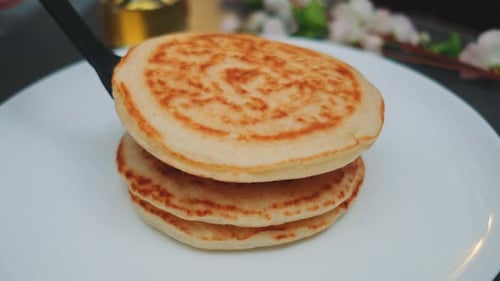 Stack of Pancakes Served on Plate