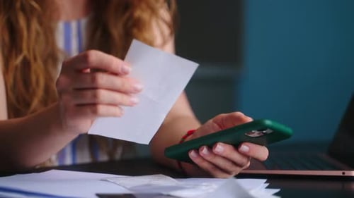 Closeup Woman Calculates Expenses on Bills Increased Utilities Prices List Female Bookkeeping Income