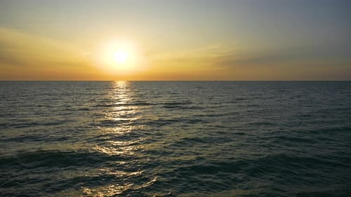 Big Yellow Sun on Dramatic Bright Sky Ocean Sunset Soft Evening Horizont Over Sea Dark Water