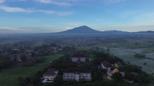 Aerial view, the morning view of the city of Yogyakarta and the magnificent Mount Merapi