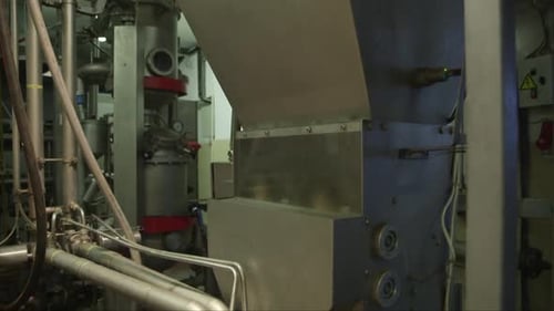 different ingredients are added in a mixer in a chocolate factory