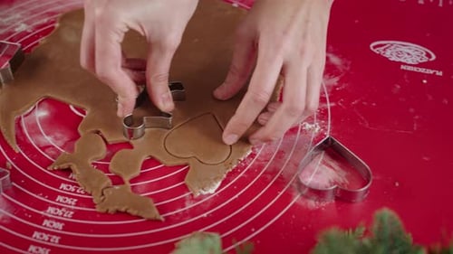 Cutting Holiday Cookie Dough with Cookie Cutters