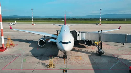 The Plane is at the Airport Waiting to Depart