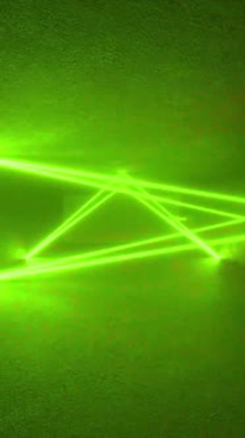 A yellow light shines through a window