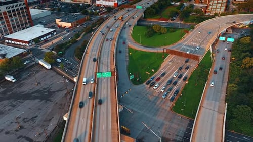 Flying above the highways with lively traffic. Philadelphia roads from aerial perspective.
