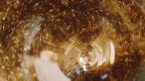 Abstraction of a Swirling Whirlpool of Golden Liquid with a Swaying Reflection on Its Surface with a