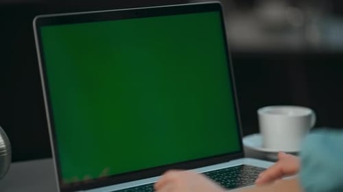 Unrecognized Freelancer Using Green Screen Laptop Office