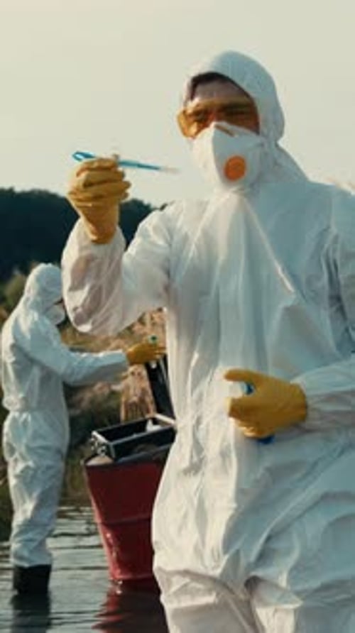 Scientists in Hazmat Suits Test Water Quality