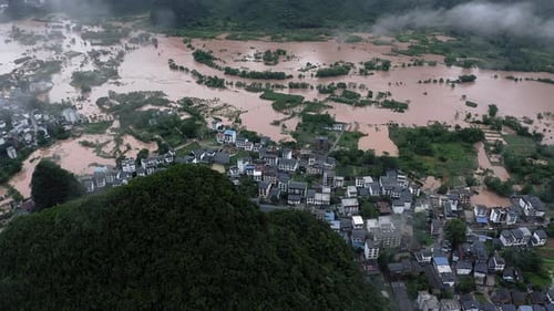 Chinese town submerged in water, Guangxi flooding natural disaster, aerial