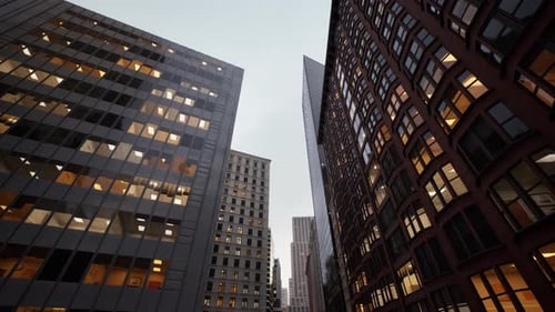 Escena matutina urbana que muestra altas estructuras de vidrio y profesionales activos en movimiento