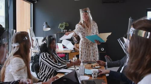 Beautiful Excited Blonde Female Boss Leads Multiethnic Business Team Office Meeting All Wearing