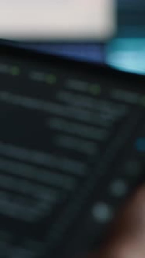 Vertical Video AI Interface Detail Beside Server Technicians