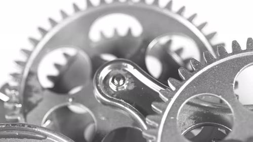 Silver Gears Rotating in Close Up View