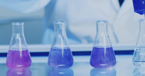 Medical Research Experiment with Color-Changing Liquid in Lab