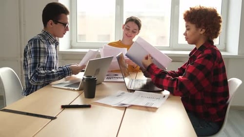 Team at Work Office Meeting Group of Young Business People Working Together in Creative Office Happy