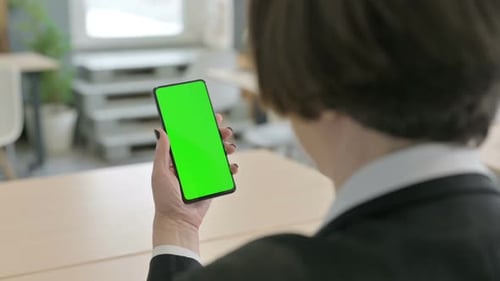 Old Businesswoman Using Phone with Green Chroma Screen