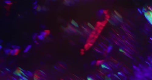 Colorful Light Leaks and Reflections on Dark Background