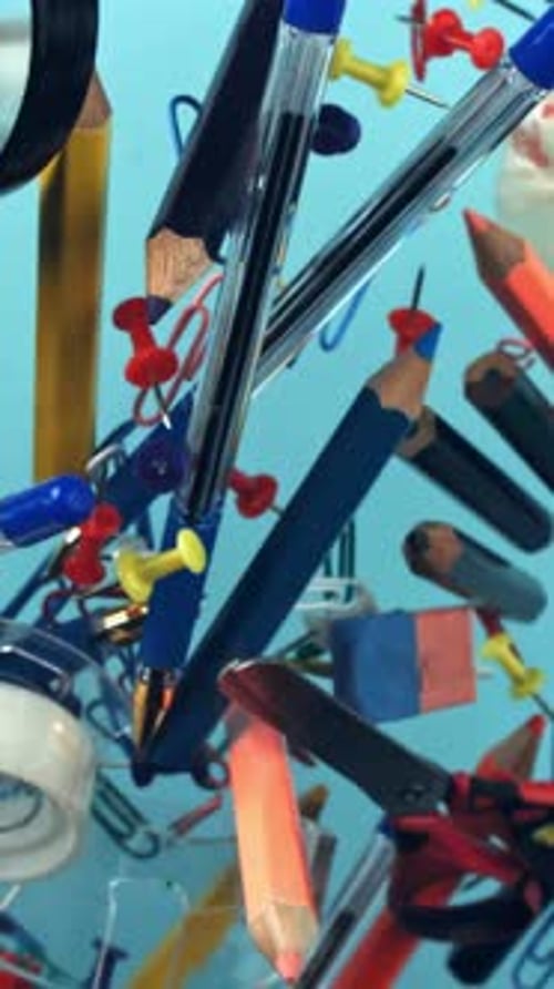 Different School Tools Fly Up and Down Back to School Filmed on a Highspeed Camera at 1000 Fps