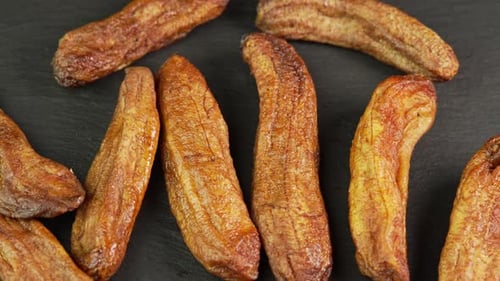 Delicious Dried Bananas on a Dark Background