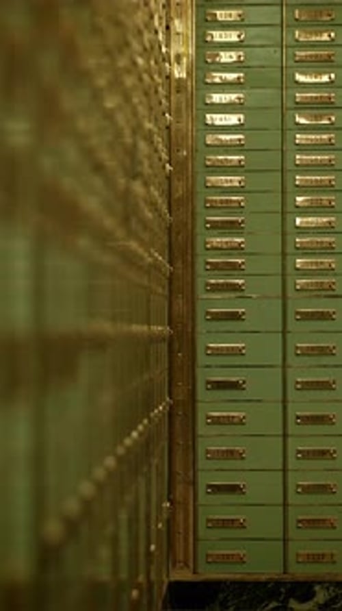 Vintage Safety Deposit Boxes in a Bank Vault