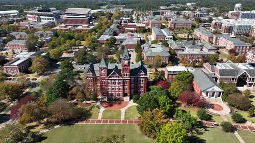 Beautiful college campus in America. Aerial view of Auburn University's Samford Hall. Many brick bui