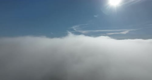 Aerial View of Clouds Under the Blue Sky