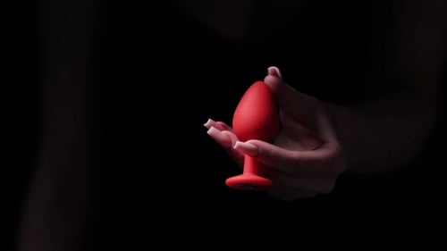 Metal anal plug with a pink crystal in a girl's hand on a black background. Sex shop, Adult store. B, Slow Motion Stock Footage ft. hand & shiny - Envato Metal anal plug with a pink crystal in a girl's hand on a black background. Sex shop, Adult store. B, Slow Motion Stock Footage ft. hand & shiny - Envato