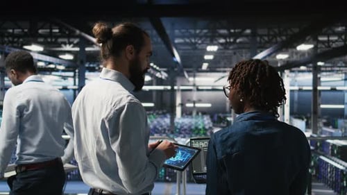 Data Center System Administrators Performing Maintenance on AI Supercomputers