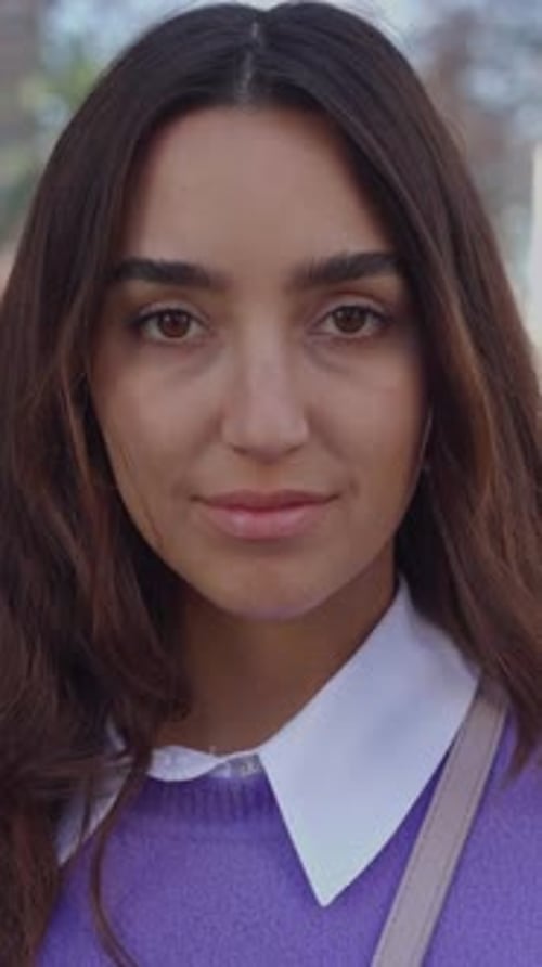 Young Latin American Trendy Woman Looking at Camera Smile in City