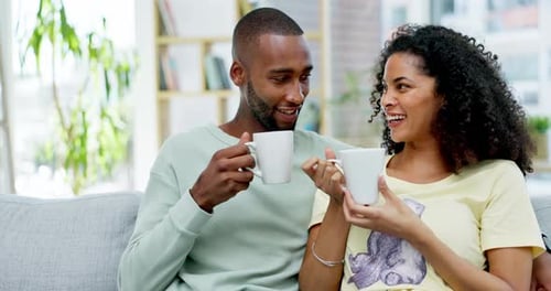 Loving Couple Drinking Coffee Together at Home